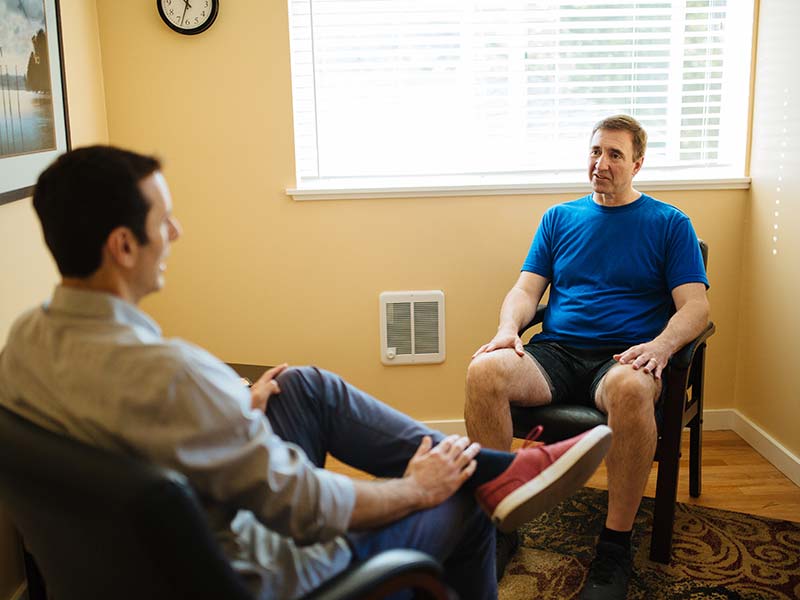 Individuals Sitting and Talking